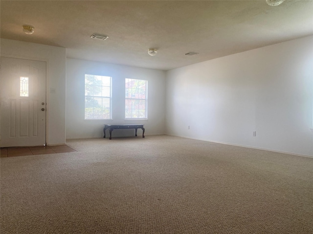 19042 Yaupon Ranch Dr, Cypress, TX 77433 - empty room with light colored carpet and baseboards