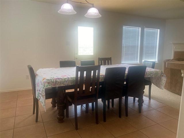 19042 Yaupon Ranch Dr, Cypress, TX 77433 - dining area with light tile patterned flooring and baseboards