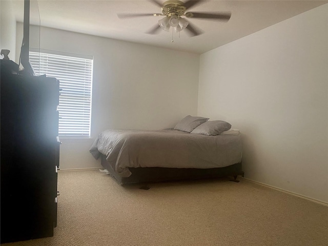 19042 Yaupon Ranch Dr, Cypress, TX 77433 - carpeted bedroom with baseboards and a ceiling fan