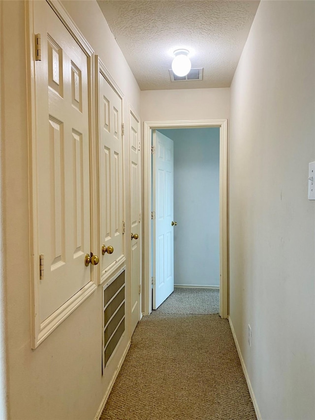 19042 Yaupon Ranch Dr, Cypress, TX 77433 - corridor with carpet floors and a textured ceiling