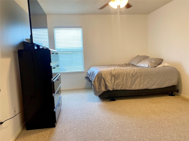 19042 Yaupon Ranch Dr, Cypress, TX 77433 - bedroom featuring light carpet and a ceiling fan