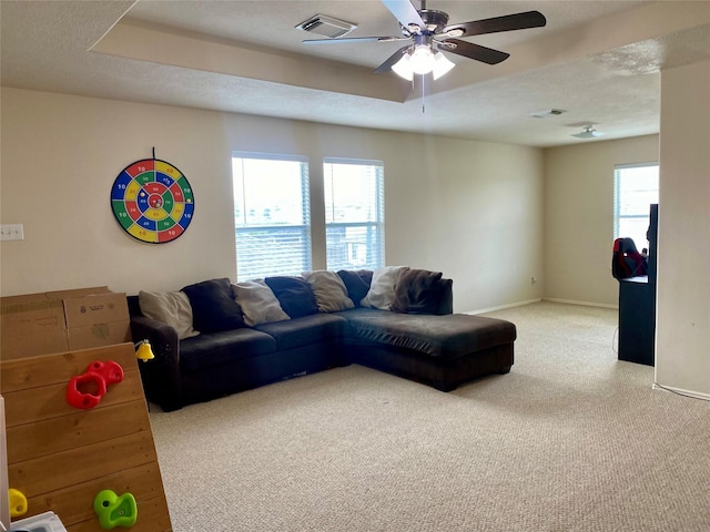 19042 Yaupon Ranch Dr, Cypress, TX 77433 - living room with light carpet and ceiling fan