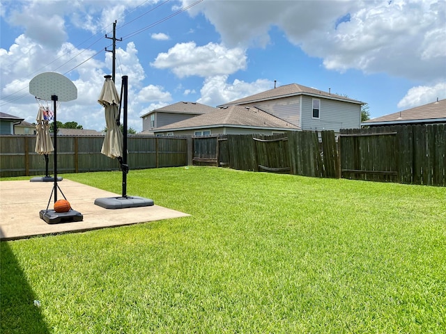 19042 Yaupon Ranch Dr, Cypress, TX 77433 - fenced backyard with a patio area