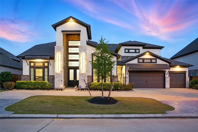 18011 Brazos River Cir, Cypress, TX 77433 - modern home featuring french doors, stucco siding, stone siding, and driveway