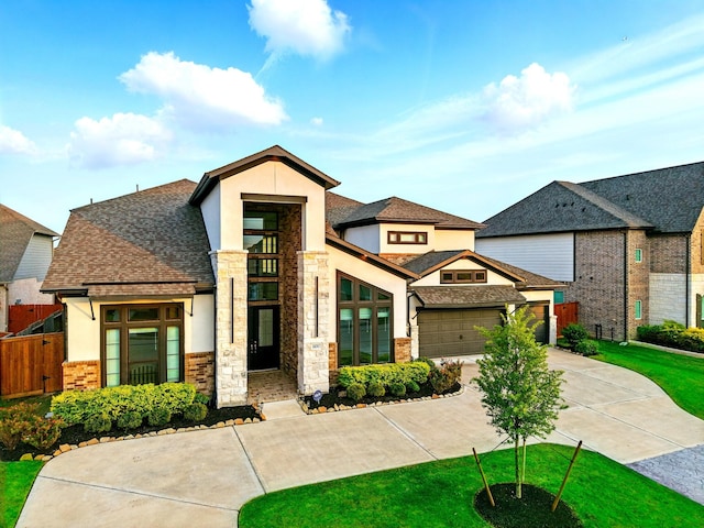 18011 Brazos River Cir, Cypress, TX 77433 - view of front of house with stucco siding, roof with shingles, and concrete driveway