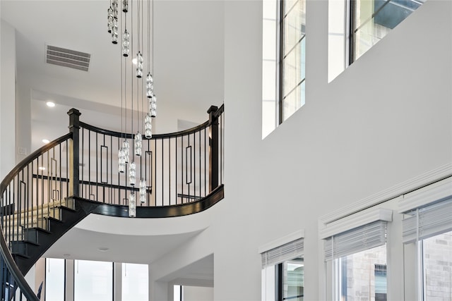 18011 Brazos River Cir, Cypress, TX 77433 - stairway featuring a towering ceiling