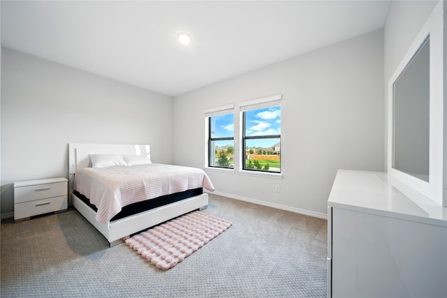 18011 Brazos River Cir, Cypress, TX 77433 - carpeted bedroom featuring baseboards