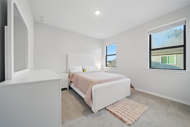 18011 Brazos River Cir, Cypress, TX 77433 - bedroom featuring light carpet, baseboards, and recessed lighting