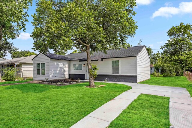 5751 Belmark St, Houston, TX 77033 - single story home featuring brick siding and roof with shingles