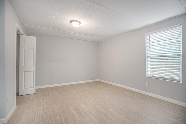 7449 Walker St, Houston, TX 77011 - unfurnished room featuring light wood-type flooring and baseboards