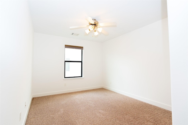 1306 Malone St, Houston, TX 77007 - carpeted spare room featuring baseboards and ceiling fan