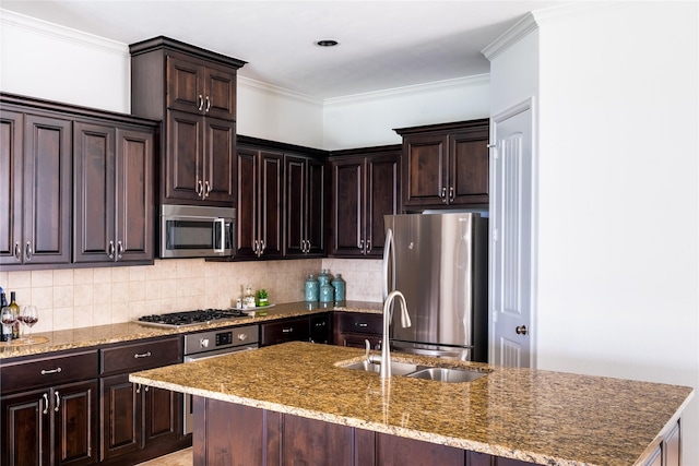 1306 Malone St, Houston, TX 77007 - kitchen with stainless steel appliances, a sink, decorative backsplash, light stone countertops, and dark brown cabinets