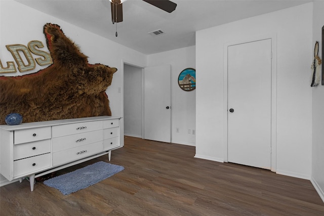 1137 Jones Rd, New Waverly, TX 77358 - bedroom featuring wood finished floors, baseboards, and ceiling fan