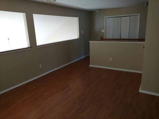 3502 Sheldon Dr, Pearland, TX 77584 - spare room featuring wood finished floors and baseboards