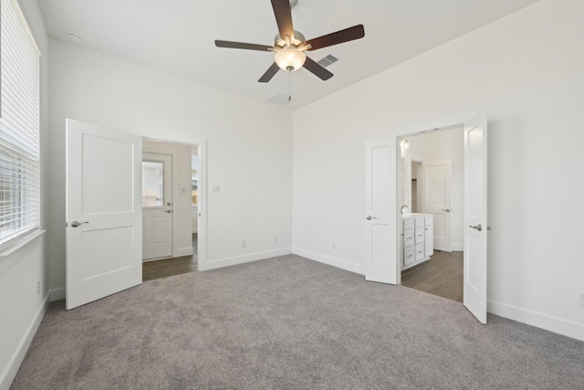 19265 Hazel Firs Ct, Magnolia, TX 77355 - unfurnished bedroom featuring carpet, ceiling fan, and ensuite bath