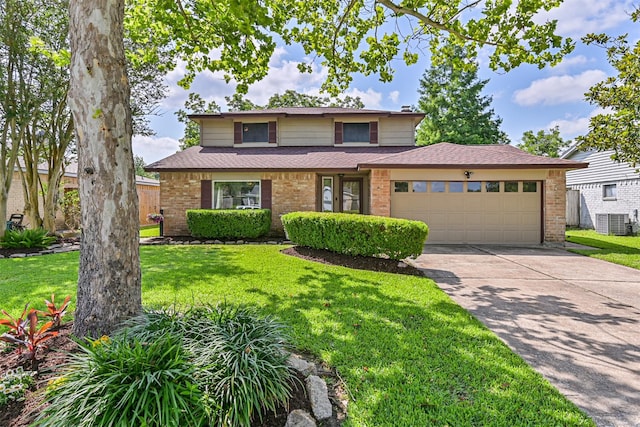 4211 Lucian Ln, Friendswood, TX 77546 - traditional-style house featuring brick siding, an attached garage, central AC unit, and a front lawn