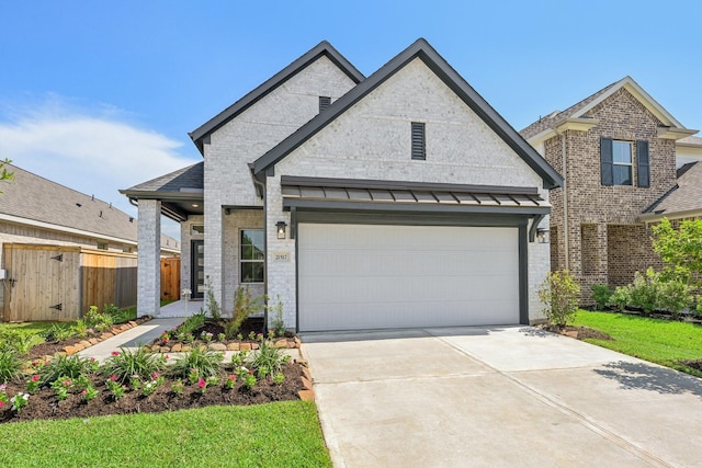 21517 Witham Promenade Ln, Magnolia, TX 77355 - view of front of property featuring driveway and brick siding
