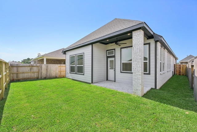 21517 Witham Promenade Ln, Magnolia, TX 77355 - rear view of property featuring ceiling fan, a fenced backyard, a shingled roof, and a patio area