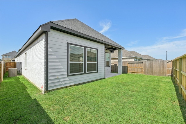 21517 Witham Promenade Ln, Magnolia, TX 77355 - rear view of property featuring a fenced backyard and roof with shingles