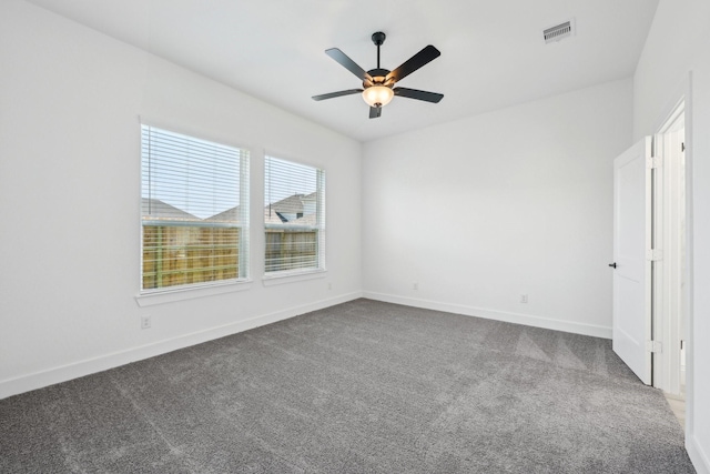 21517 Witham Promenade Ln, Magnolia, TX 77355 - unfurnished bedroom featuring dark carpet, baseboards, and a ceiling fan