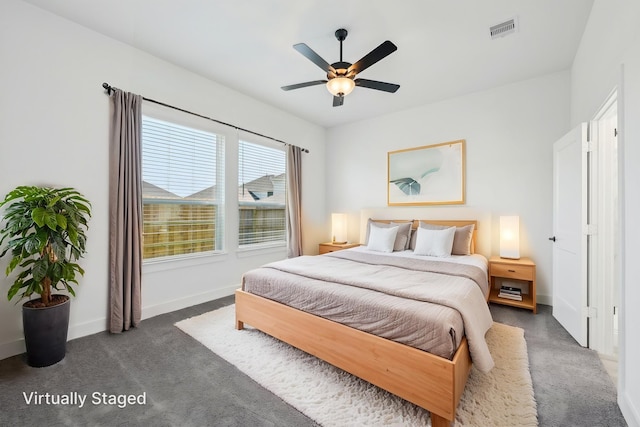 21517 Witham Promenade Ln, Magnolia, TX 77355 - carpeted bedroom featuring baseboards and ceiling fan