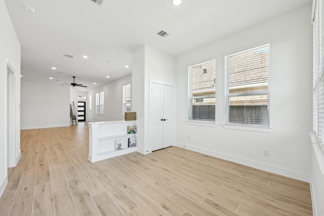 21517 Witham Promenade Ln, Magnolia, TX 77355 - unfurnished room featuring baseboards, light wood-style flooring, recessed lighting, and ceiling fan