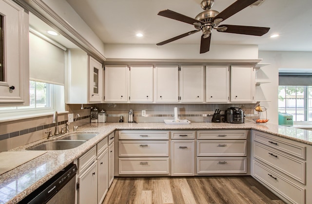 12103 Moorcreek Dr, Houston, TX 77070 - kitchen with a sink, dishwasher, open shelves, tasteful backsplash, and recessed lighting