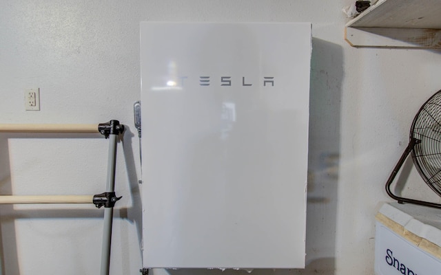 12103 Moorcreek Dr, Houston, TX 77070 - detailed view of wall-mounted power storage