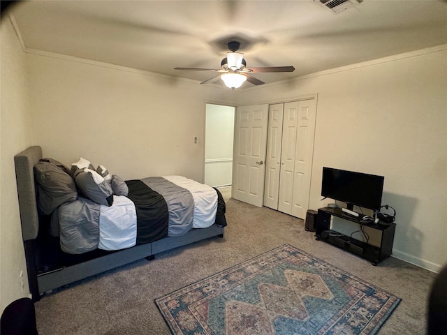 12103 Moorcreek Dr, Houston, TX 77070 - bedroom with carpet floors, a ceiling fan, a closet, and crown molding