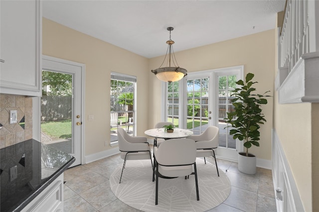 926 Montview Dr, Katy, TX 77450 - dining space with plenty of natural light, baseboards, and light tile patterned floors