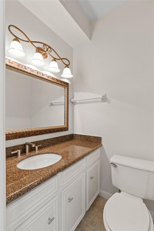 926 Montview Dr, Katy, TX 77450 - half bathroom with vanity, toilet, and baseboards