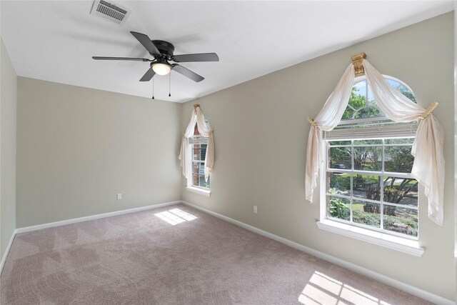 926 Montview Dr, Katy, TX 77450 - carpeted spare room with healthy amount of natural light, baseboards, and a ceiling fan