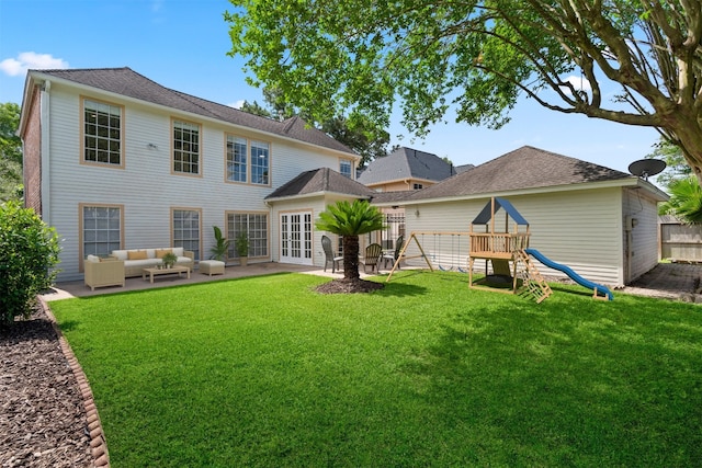 926 Montview Dr, Katy, TX 77450 - back of house featuring a playground, an outdoor living space, french doors, and a patio