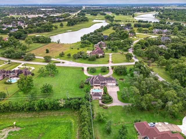 4911 Shiloh Lake Dr, Richmond, TX 77407 - aerial view of a nearby body of water and a tree filled landscape
