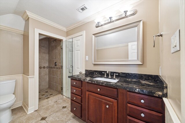 4911 Shiloh Lake Dr, Richmond, TX 77407 - bathroom with vanity, toilet, a shower stall, crown molding, and tile patterned flooring