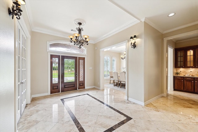 4911 Shiloh Lake Dr, Richmond, TX 77407 - foyer entrance featuring a chandelier, baseboards, ornamental molding, french doors, and recessed lighting