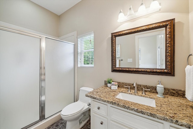 4911 Shiloh Lake Dr, Richmond, TX 77407 - full bath featuring vanity, a shower stall, and toilet
