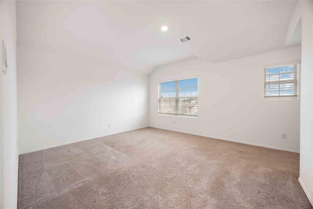 14611 Broadbury Pond Rd, Rosharon, TX 77583 - empty room featuring carpet, healthy amount of natural light, lofted ceiling, baseboards, and recessed lighting