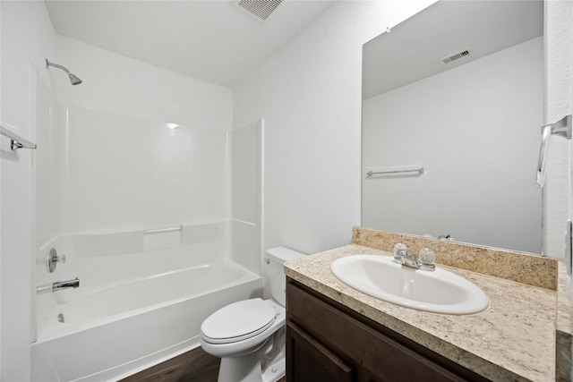 14611 Broadbury Pond Rd, Rosharon, TX 77583 - bathroom featuring toilet, vanity, shower / bathtub combination, and wood finished floors