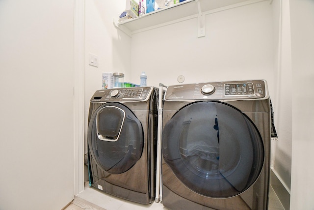 7603 Jacquelyn Gardens Ln, Houston, TX 77055 - washroom featuring washing machine and dryer