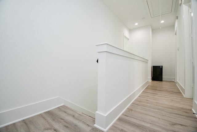7603 Jacquelyn Gardens Ln, Houston, TX 77055 - staircase featuring attic access, wood finished floors, baseboards, and recessed lighting