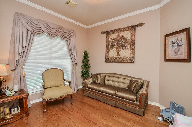 1511 Baldridge Ln, Katy, TX 77494 - sitting room featuring crown molding, wood finished floors, and baseboards