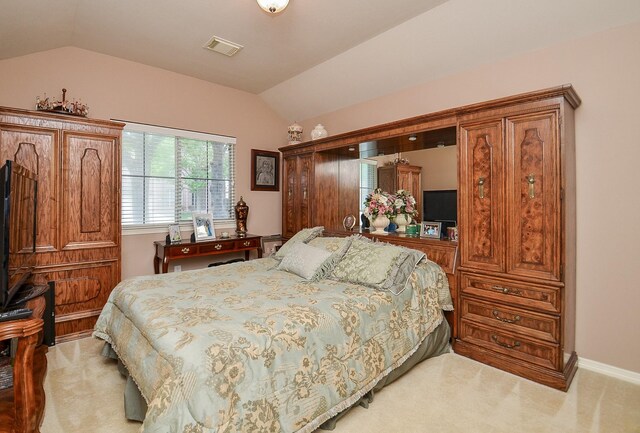 1511 Baldridge Ln, Katy, TX 77494 - bedroom with lofted ceiling, light carpet, and baseboards