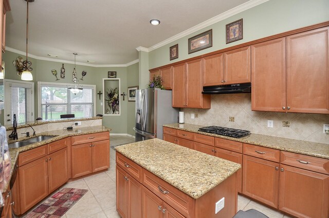 1511 Baldridge Ln, Katy, TX 77494 - kitchen featuring a sink, under cabinet range hood, stainless steel fridge, a center island, and black gas cooktop