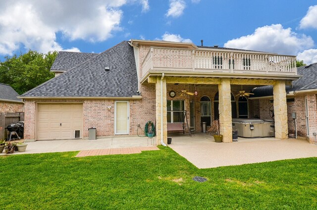 1511 Baldridge Ln, Katy, TX 77494 - back of property with a balcony, roof with shingles, a ceiling fan, a garage, and brick siding