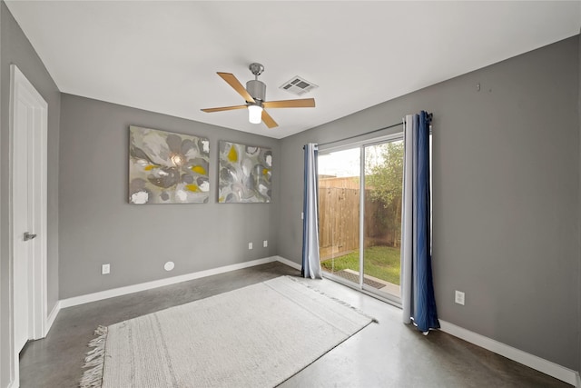 1716 W Dallas St Unit 11, Houston, TX 77019 - empty room with finished concrete flooring, ceiling fan, and baseboards