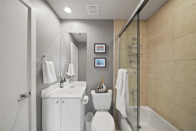 1716 W Dallas St Unit 11, Houston, TX 77019 - full bathroom featuring vanity, toilet, and shower / bath combination with glass door