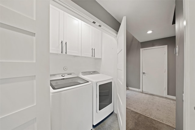 1716 W Dallas St Unit 11, Houston, TX 77019 - washroom with washer and clothes dryer, baseboards, cabinet space, and recessed lighting
