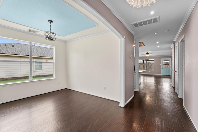 1910 Serenata Ln, Humble, TX 77396 - corridor with a chandelier, crown molding, baseboards, dark wood-style floors, and recessed lighting