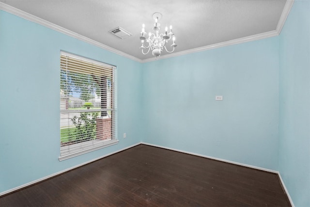 1910 Serenata Ln, Humble, TX 77396 - spare room featuring a chandelier, ornamental molding, dark wood-style flooring, and baseboards